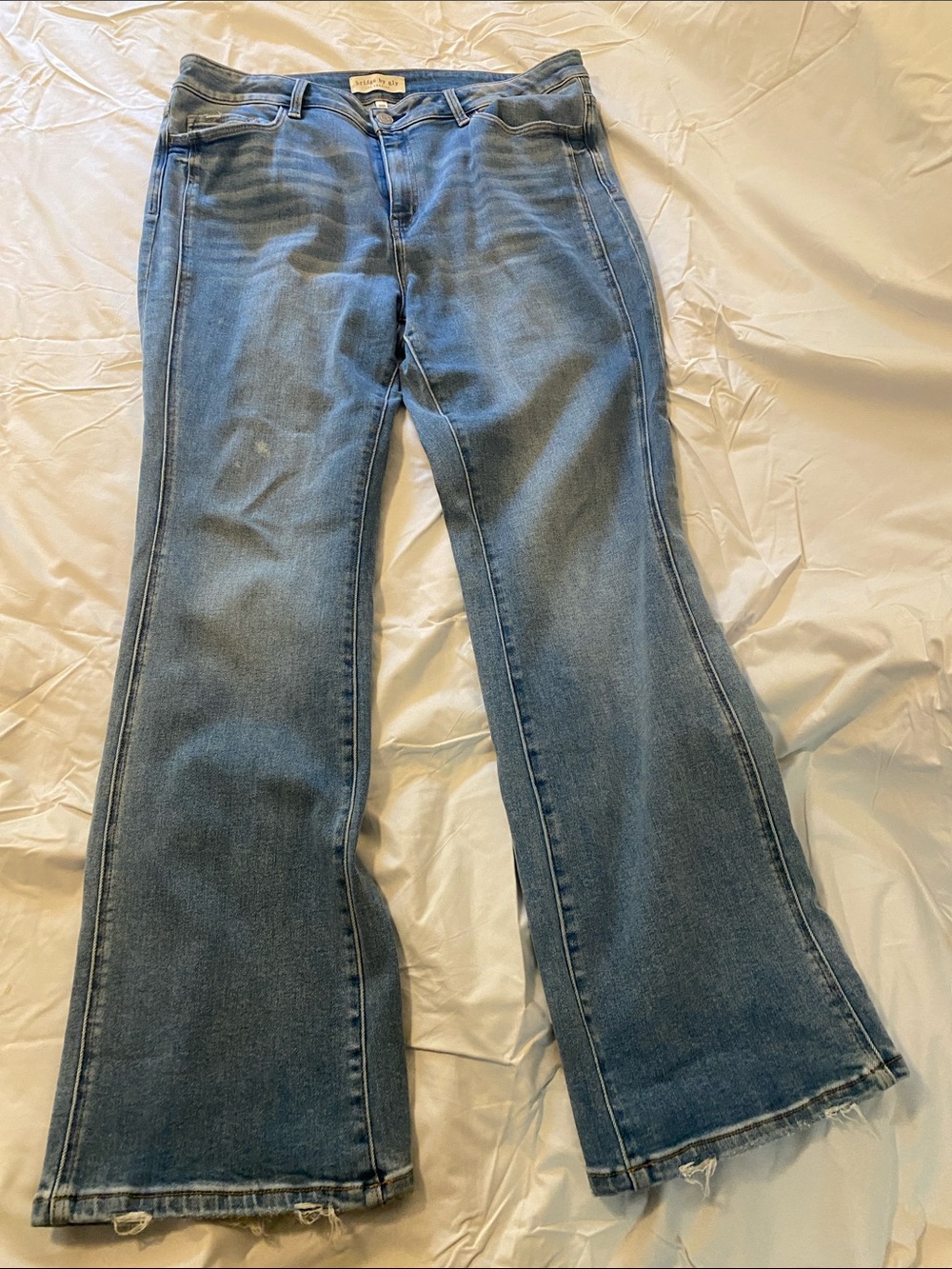 Mid-Rise Blue Flare Jeans with Raw Hem